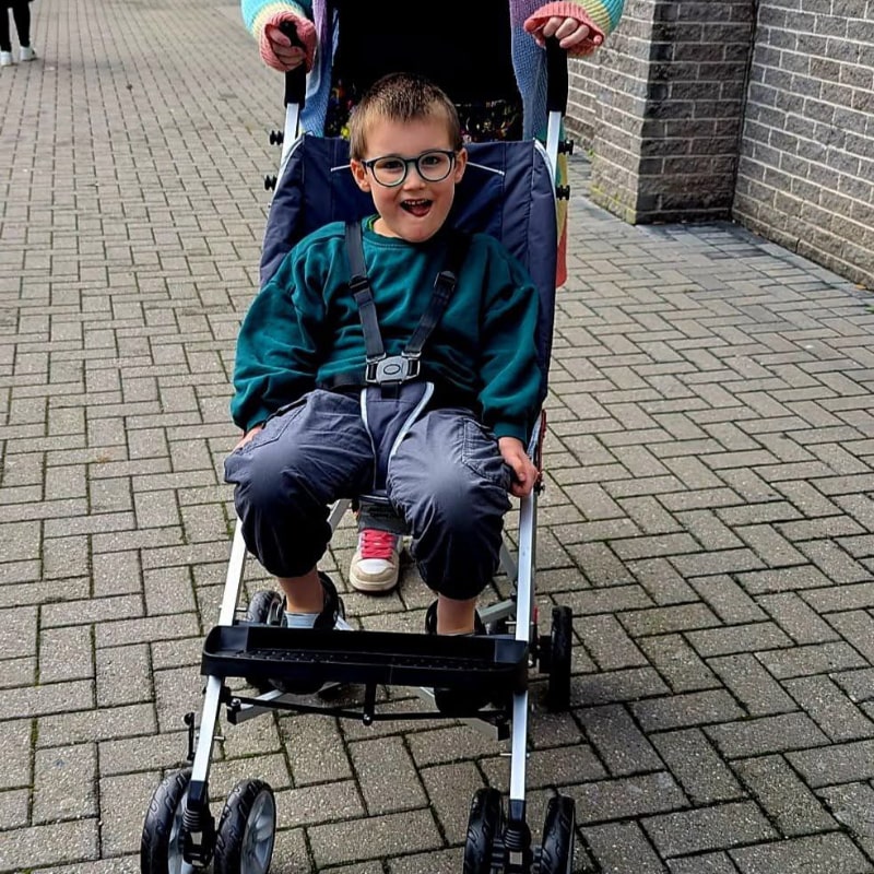 A Photo Of One Of The Children We Provided A Specialist Buggy To